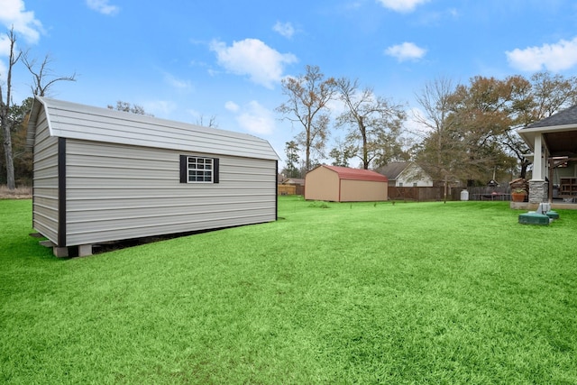 view of yard featuring a storage unit