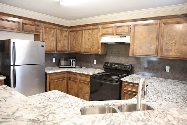 kitchen featuring tasteful backsplash, sink, ornamental molding, stainless steel appliances, and light stone countertops