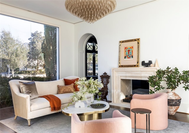 sitting room featuring plenty of natural light and hardwood / wood-style floors