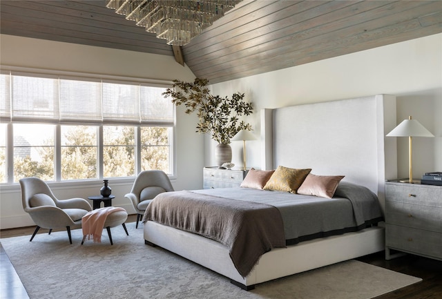 bedroom featuring hardwood / wood-style flooring, wood ceiling, and lofted ceiling