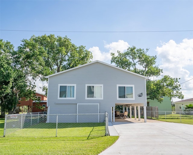 view of side of property featuring a yard and a garage