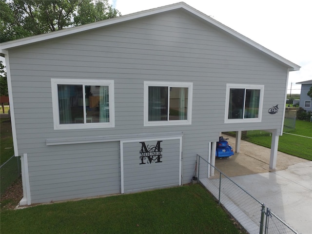 view of property exterior featuring a yard