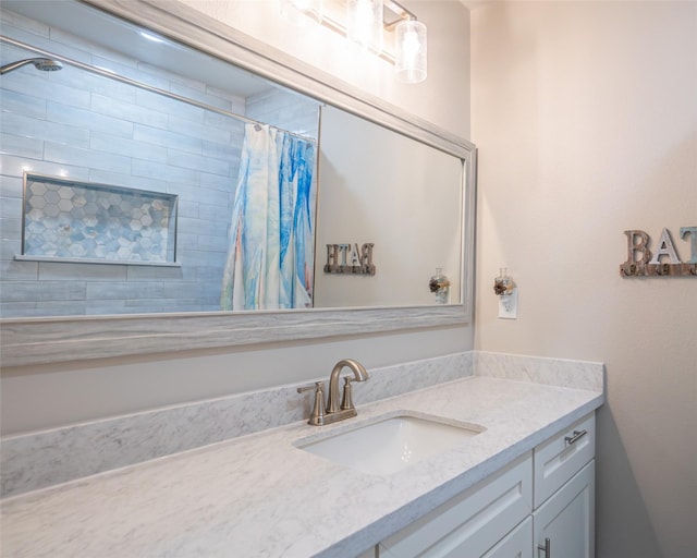 bathroom with vanity and a shower with shower curtain