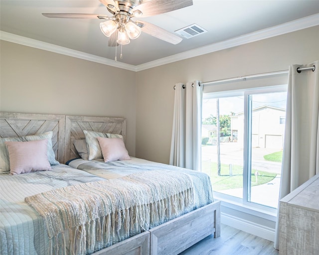 bedroom with ceiling fan, ornamental molding, access to exterior, and light wood-type flooring