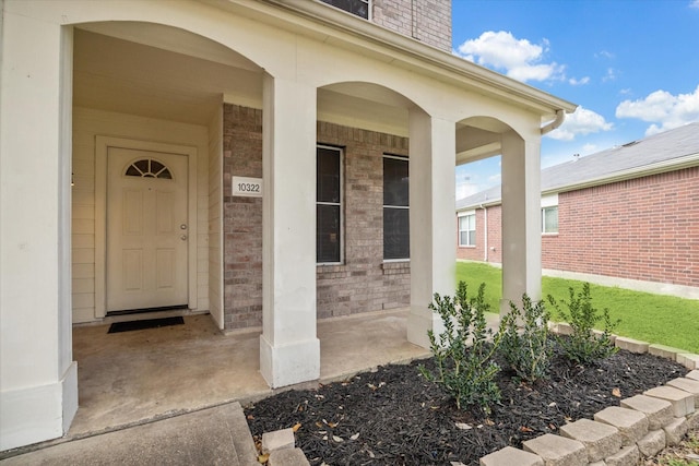 doorway to property with a porch