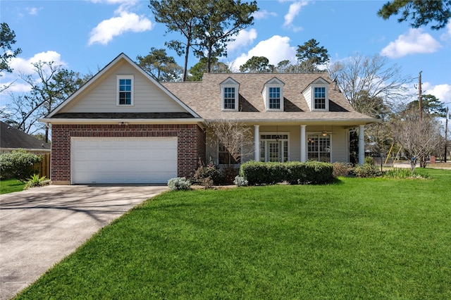 cape cod home with concrete driveway, a front lawn, a shingled roof, and brick siding