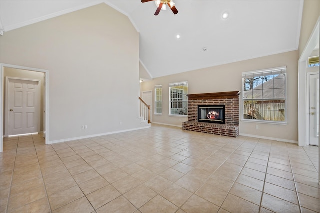 unfurnished living room with a brick fireplace, baseboards, high vaulted ceiling, and light tile patterned flooring