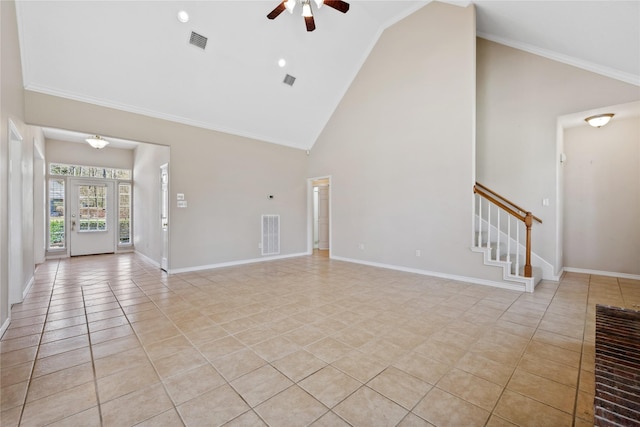 unfurnished living room with baseboards, stairs, visible vents, and light tile patterned flooring