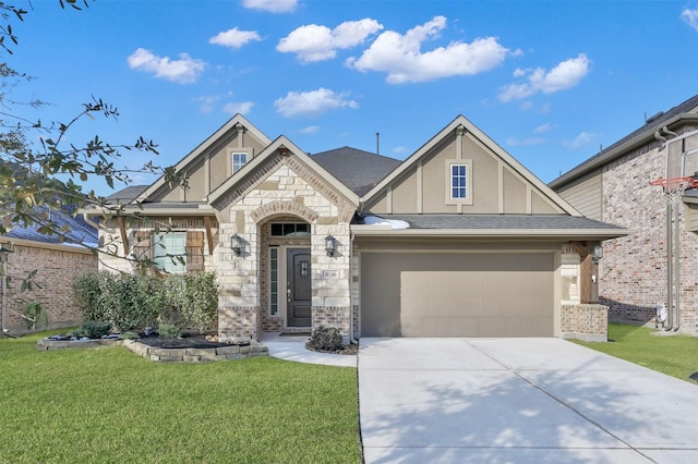 view of front of property featuring a garage and a front yard