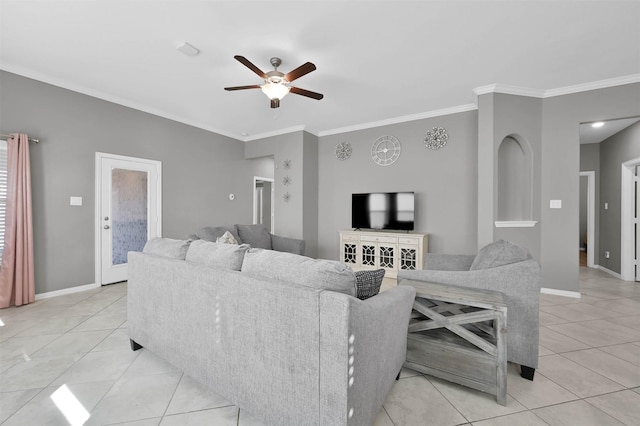 living room with light tile patterned flooring, ceiling fan, and crown molding