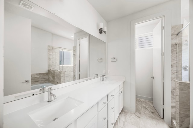 bathroom with vanity and separate shower and tub