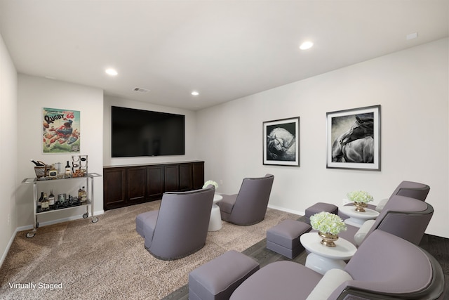 living room with light colored carpet