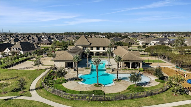 view of swimming pool featuring a gazebo, a patio area, fence, and a residential view