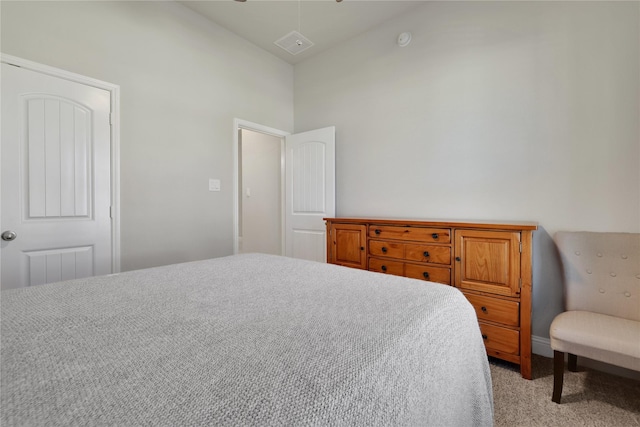 bedroom with light carpet