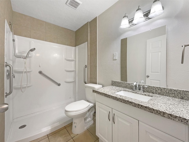 bathroom with walk in shower, tile patterned floors, toilet, and a textured ceiling