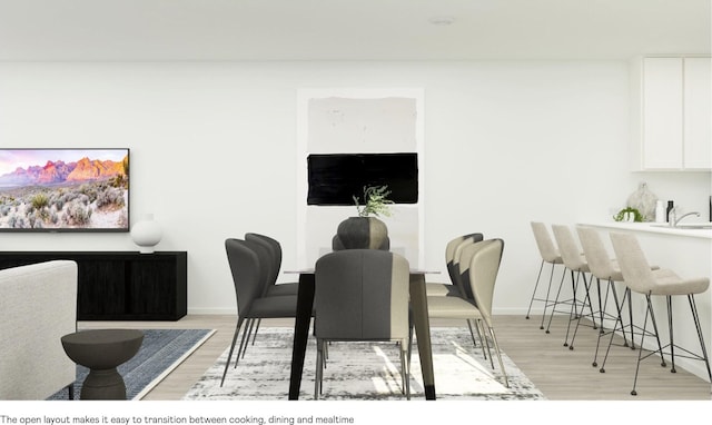 dining area with light wood-type flooring