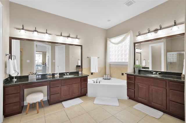 bathroom featuring vanity, separate shower and tub, and tile patterned flooring