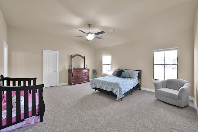 bedroom featuring vaulted ceiling, carpet flooring, and ceiling fan