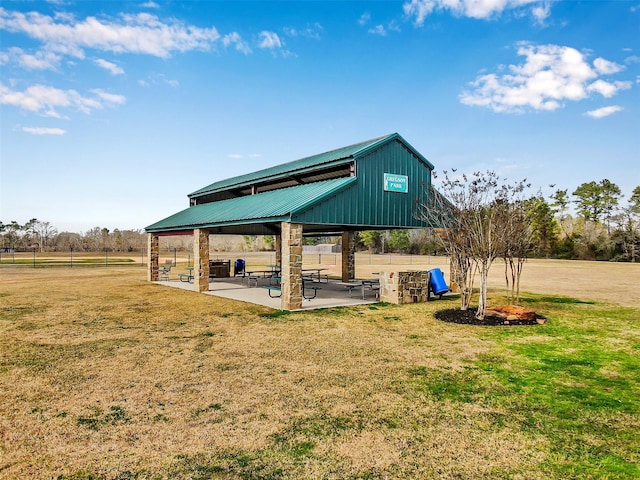 exterior space with a yard, a gazebo, and a patio area