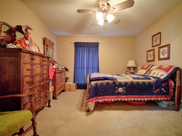 bedroom featuring ceiling fan and light colored carpet