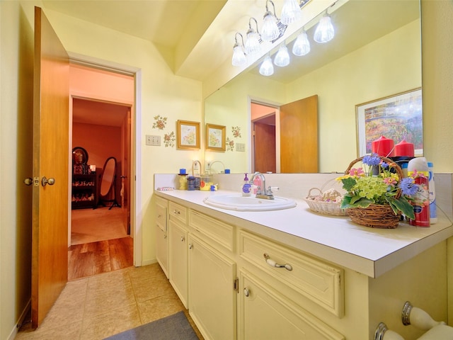 bathroom with vanity and tile patterned flooring