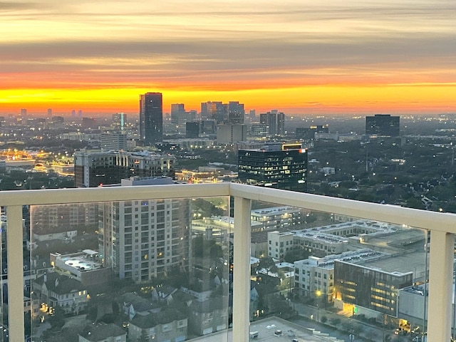 view of balcony at dusk