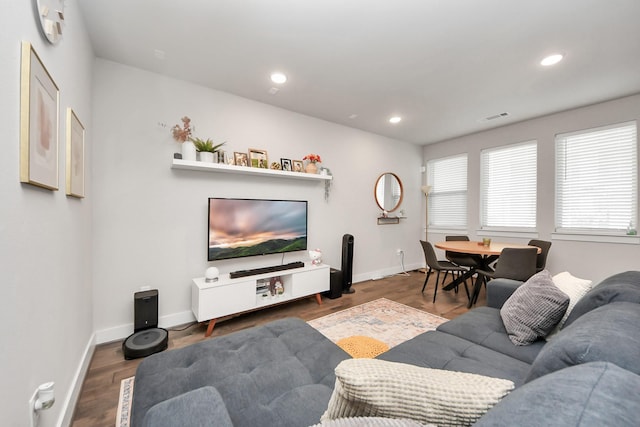 living room featuring dark hardwood / wood-style floors