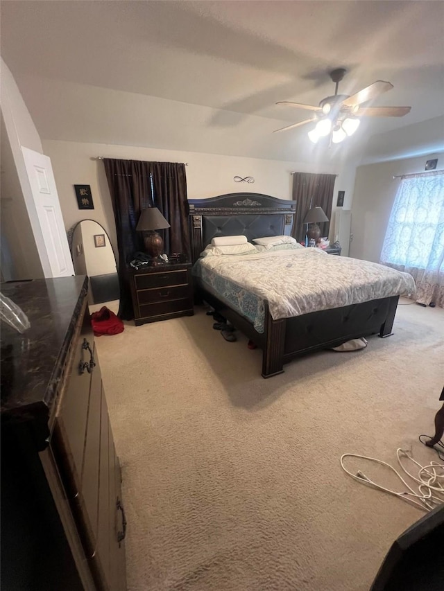 bedroom with carpet floors and ceiling fan