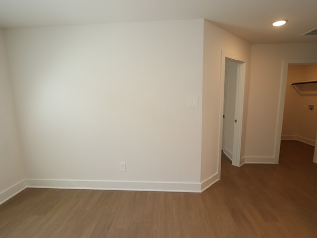 22478 Birchfield Grove Ln, New Caney, TX 77357 - empty room featuring wood finished floors, baseboards, and recessed lighting
