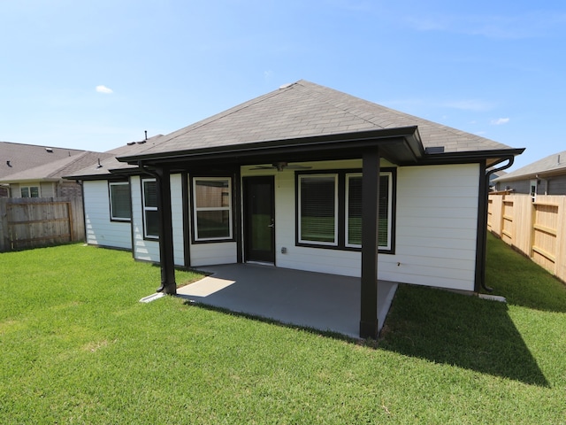 22478 Birchfield Grove Ln, New Caney, TX 77357 - back of property with ceiling fan and a patio
