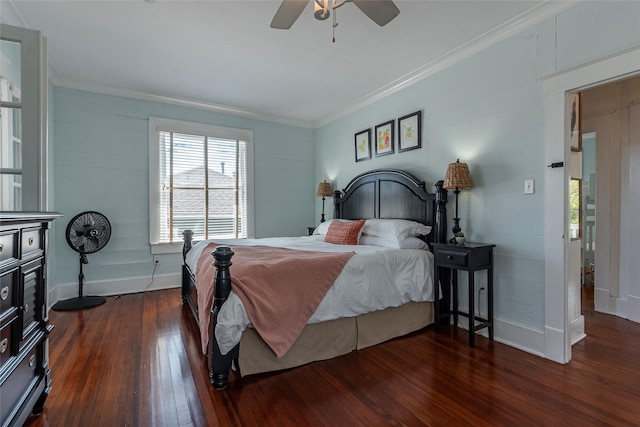 bedroom featuring crown molding, dark wood-type flooring, and ceiling fan