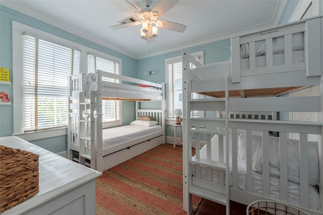 bedroom with ornamental molding