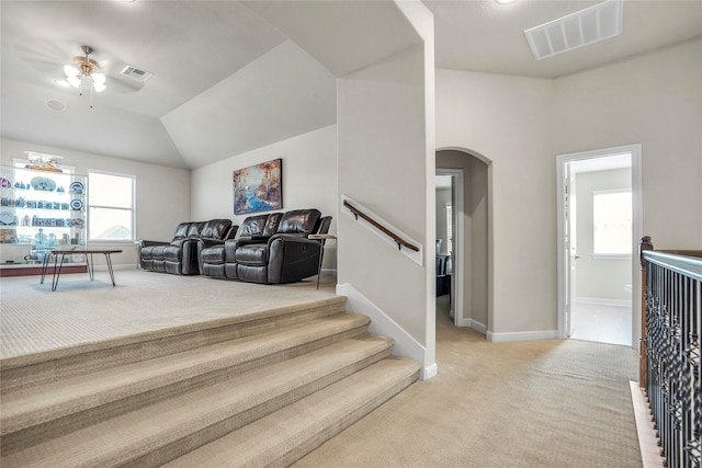 interior space featuring vaulted ceiling, a wealth of natural light, and ceiling fan