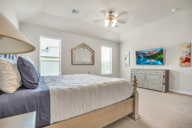 bedroom with light colored carpet and ceiling fan