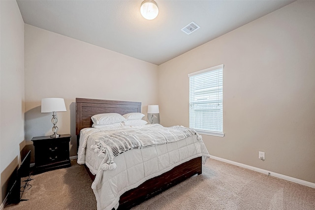 bedroom featuring carpet