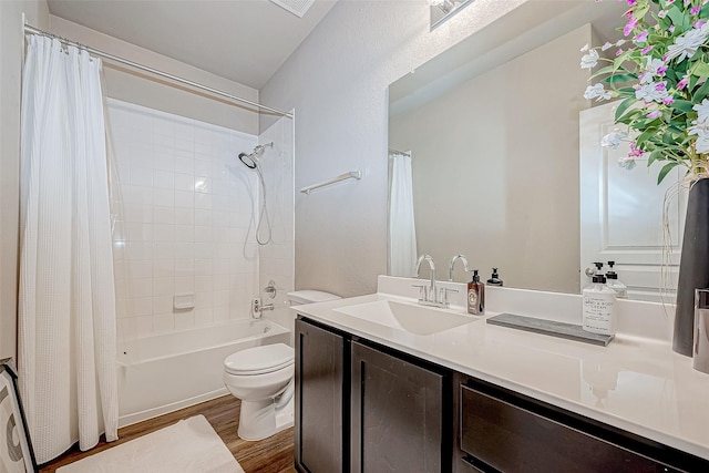 full bathroom featuring shower / tub combo with curtain, vanity, wood-type flooring, and toilet