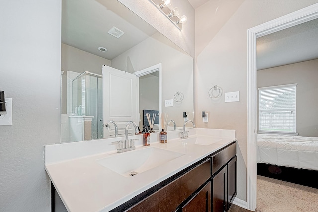 bathroom featuring vanity and walk in shower