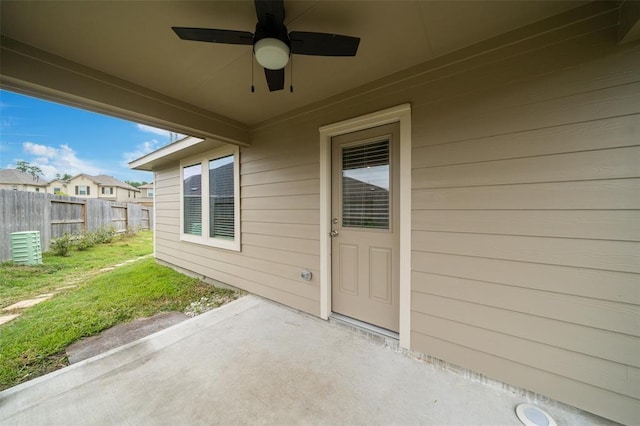 view of patio featuring ceiling fan