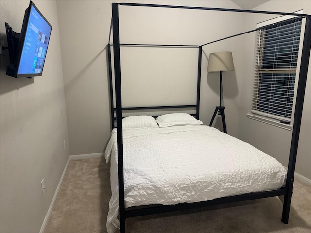 bedroom featuring carpet