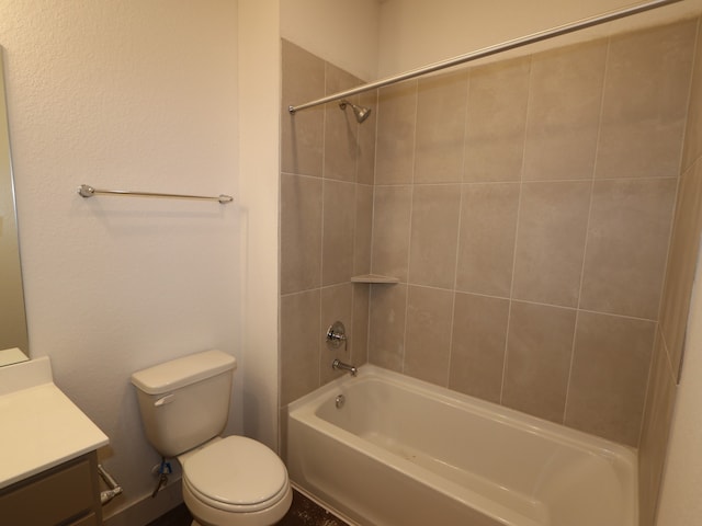 full bath with toilet, shower / bath combination, and vanity