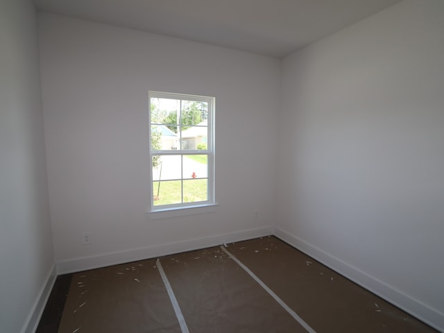 empty room with baseboards