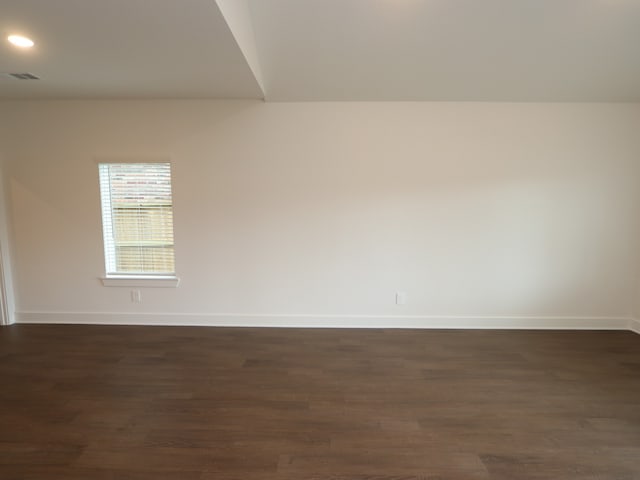 17322 Silver Birch Ct, New Caney, TX 77357 - unfurnished room with baseboards, dark wood-type flooring, and recessed lighting