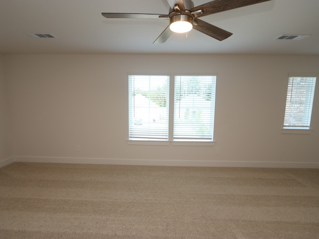 17322 Silver Birch Ct, New Caney, TX 77357 - unfurnished room featuring baseboards and light carpet