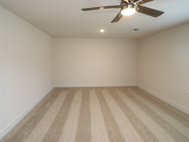 17322 Silver Birch Ct, New Caney, TX 77357 - empty room with light carpet, a ceiling fan, baseboards, and recessed lighting