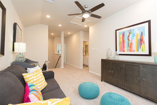 carpeted living room with lofted ceiling and ceiling fan