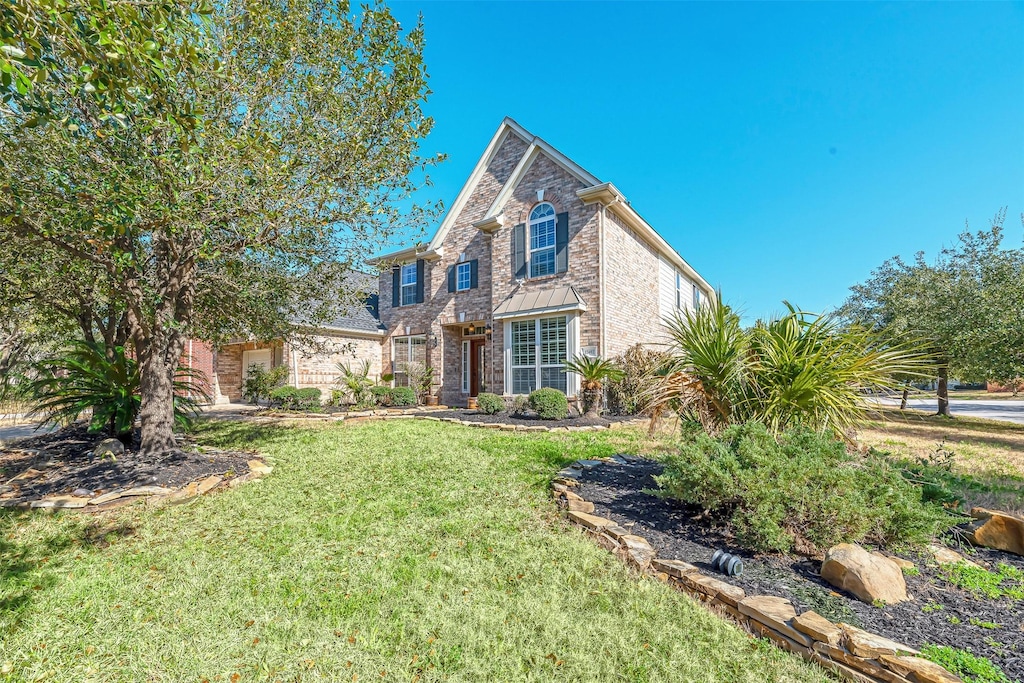 view of front of home with a front yard