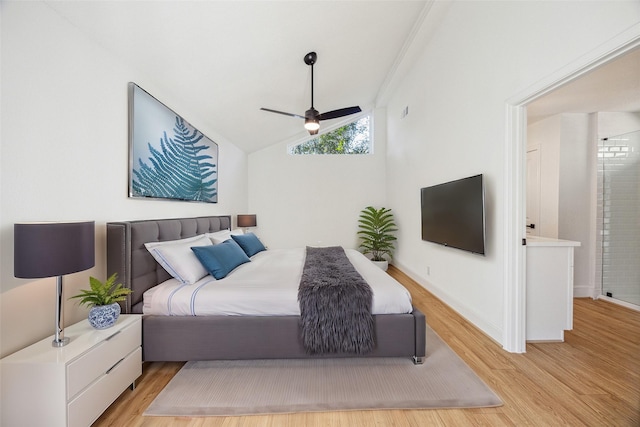 bedroom featuring lofted ceiling, light hardwood / wood-style floors, and ceiling fan