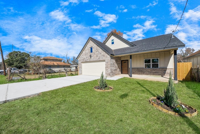 view of front facade with a garage, a front lawn, and a porch