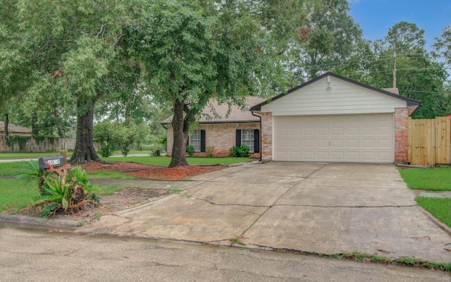 ranch-style home with a garage