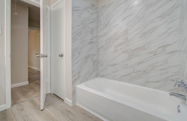 bathroom with wood-type flooring